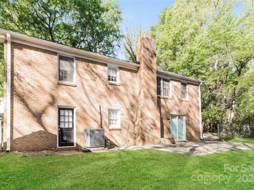 6001 Plaza Lane, Charlotte, NC 28215.  MLS# CAR4243345, YatesRealty ID 5682. Back of house