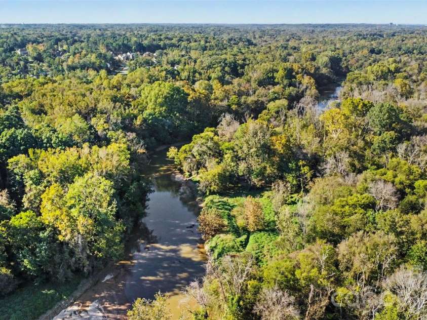 9133 Sunrise Meadow Road, Indian Land, SC 29707.  MLS# CAR4433690, YatesRealty ID 56823. River behind home
