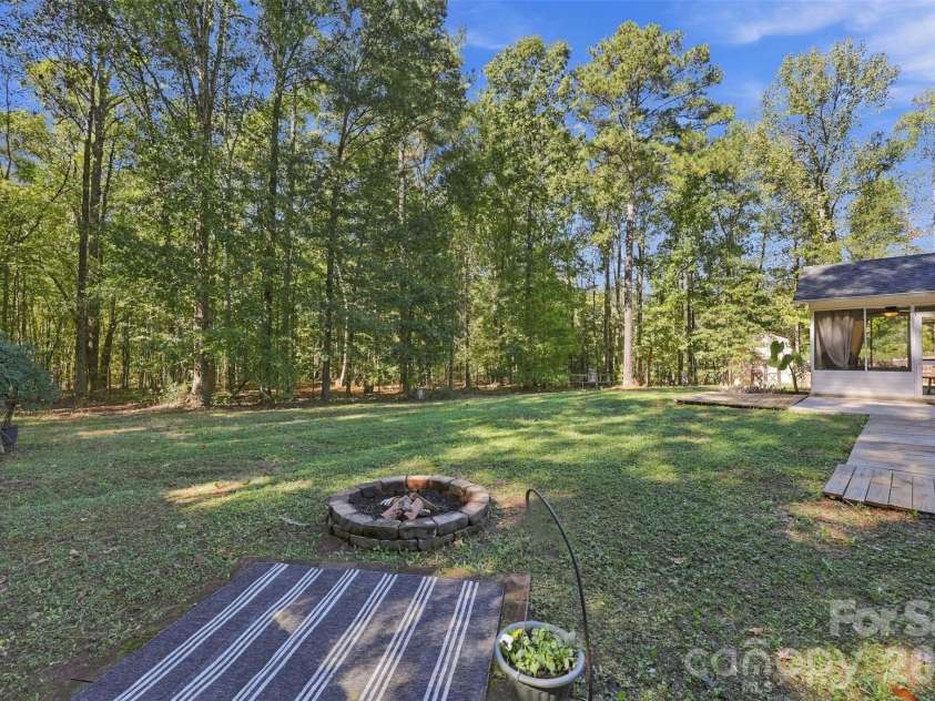 123 Sherham Way, Rock Hill, SC 29732.  MLS# CAR4432318, YatesRealty ID 56836. Firepit for family moments