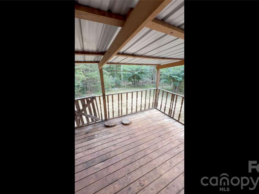 245 Ivy Road, Polkton, NC 28135.  MLS# CAR4433535, YatesRealty ID 56850. Deck Back