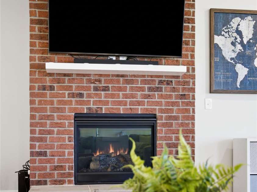 13709 Berkley Avenue, Huntersville, NC 28078.  MLS# CAR4435149, YatesRealty ID 56859. Brick fireplace