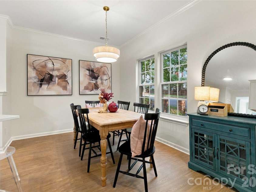 18631 Oakhurst Boulevard, Cornelius, NC 28031.  MLS# CAR4435092, YatesRealty ID 56861. New glass windows!