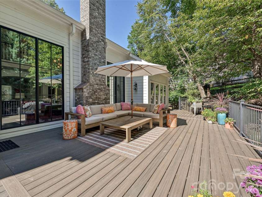 16521 Plantation Woods Drive, Charlotte, NC 28278.  MLS# CAR4434628, YatesRealty ID 56876. Large Trex deck