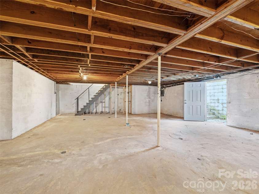 198 Roland Hill Road, Burnsville, NC 28714.  MLS# CAR4434319, YatesRealty ID 56879. Basement