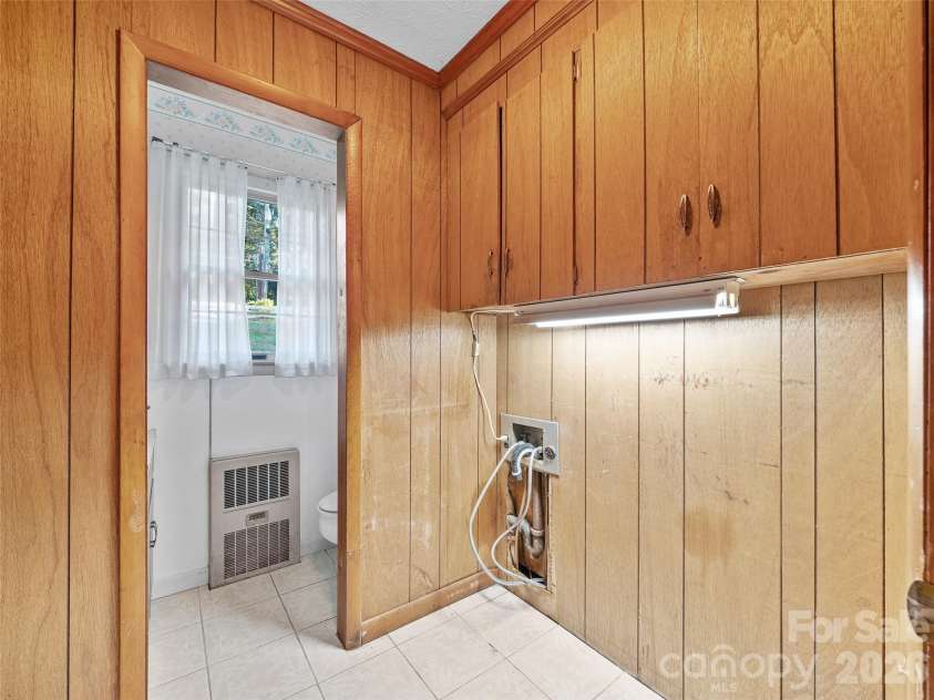 198 Roland Hill Road, Burnsville, NC 28714.  MLS# CAR4434319, YatesRealty ID 56879. Laundry Hookup/ Half Bathroom