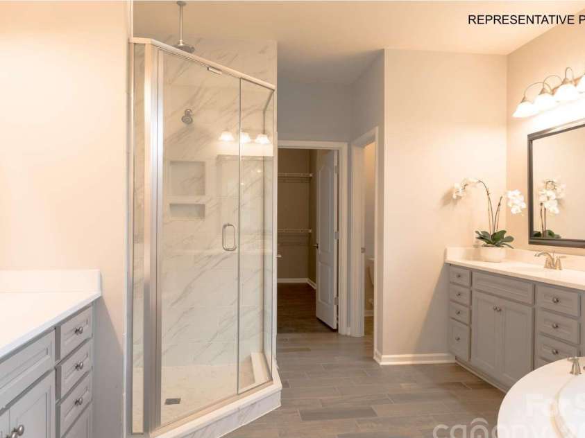 7689 Pedigree Circle, Lancaster, SC 29720.  MLS# CAR4433847, YatesRealty ID 56886. Incredibly-appointed owner's suite bathroom and HUGE walk-in closet!