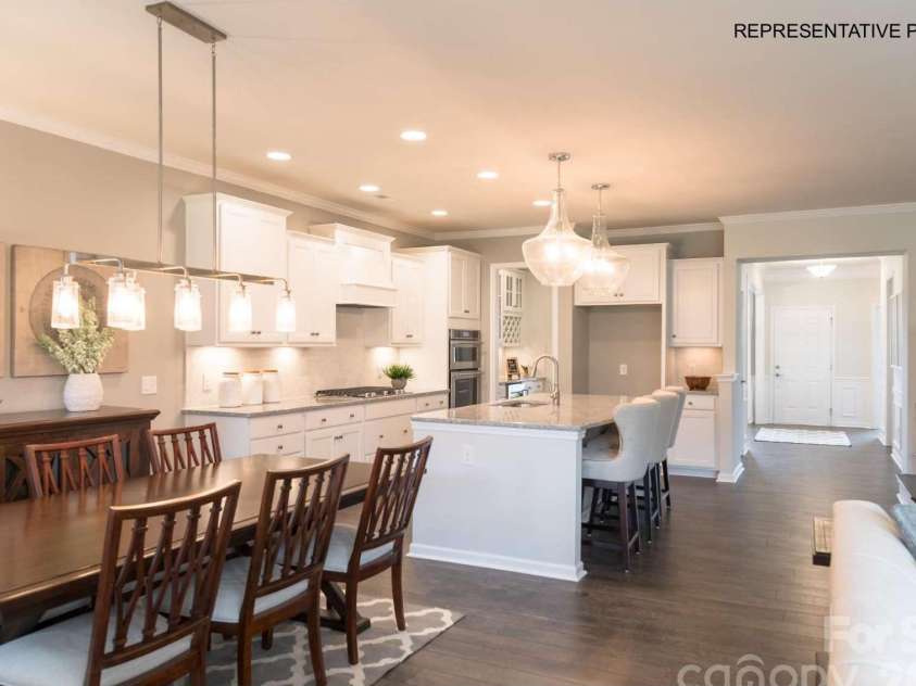 7689 Pedigree Circle, Lancaster, SC 29720.  MLS# CAR4433847, YatesRealty ID 56886. Kitchen flows seamlessly into the cafe...