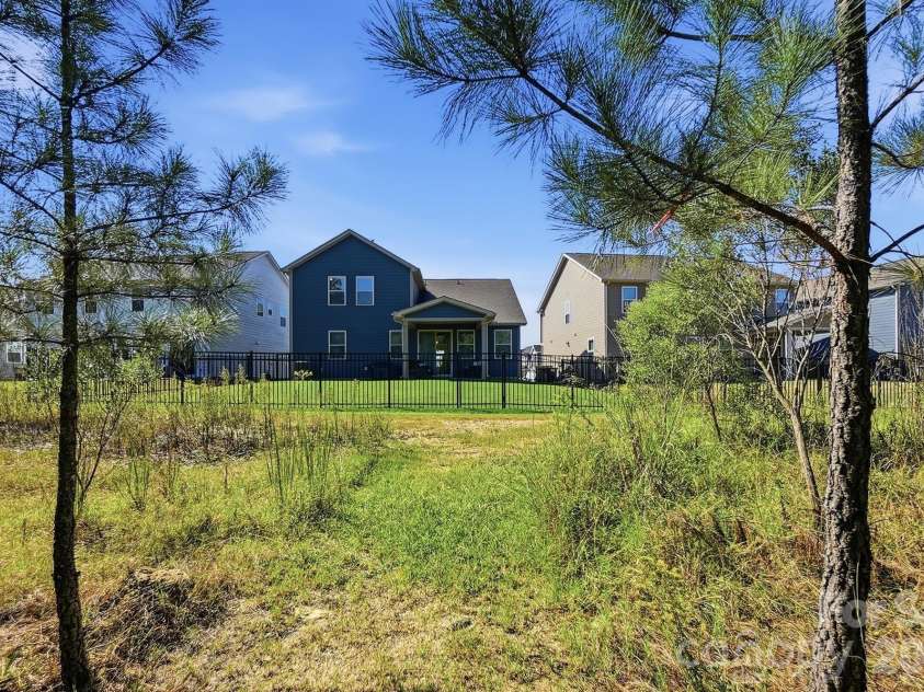 1403 Laggan Lane, Indian Trail, NC 28079.  MLS# CAR4431903, YatesRealty ID 56890. Access to the walking Trails