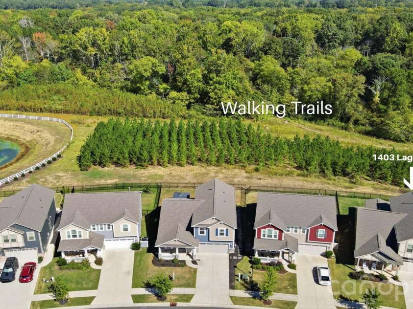 1403 Laggan Lane, Indian Trail, NC 28079.  MLS# CAR4431903, YatesRealty ID 56890. Backs up to Trees and a Walking Trail
