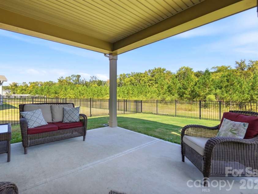 1403 Laggan Lane, Indian Trail, NC 28079.  MLS# CAR4431903, YatesRealty ID 56890. Covered Back Patio