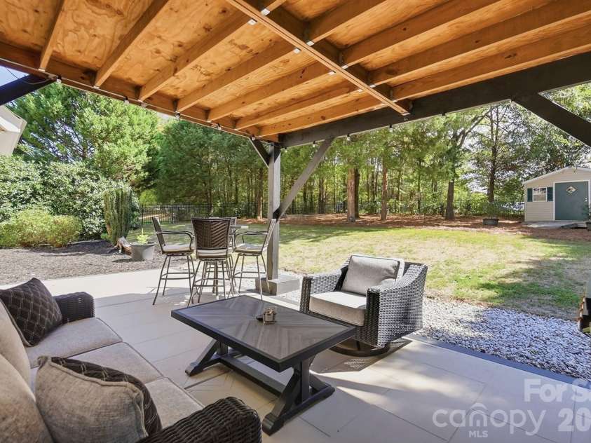 1103 Cooper Lane, Indian Trail, NC 28079.  MLS# CAR4431866, YatesRealty ID 56892. Covered Back Patio with Beautiful Views