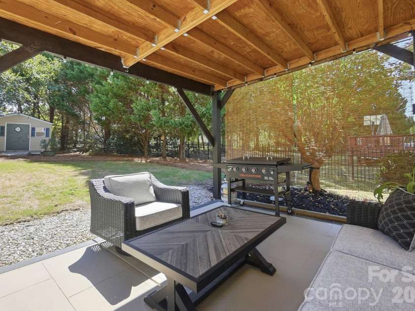 1103 Cooper Lane, Indian Trail, NC 28079.  MLS# CAR4431866, YatesRealty ID 56892. Covered Back Patio with Beautiful Views