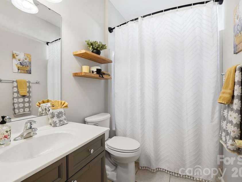 1103 Cooper Lane, Indian Trail, NC 28079.  MLS# CAR4431866, YatesRealty ID 56892. Main Floor Full Bathroom
