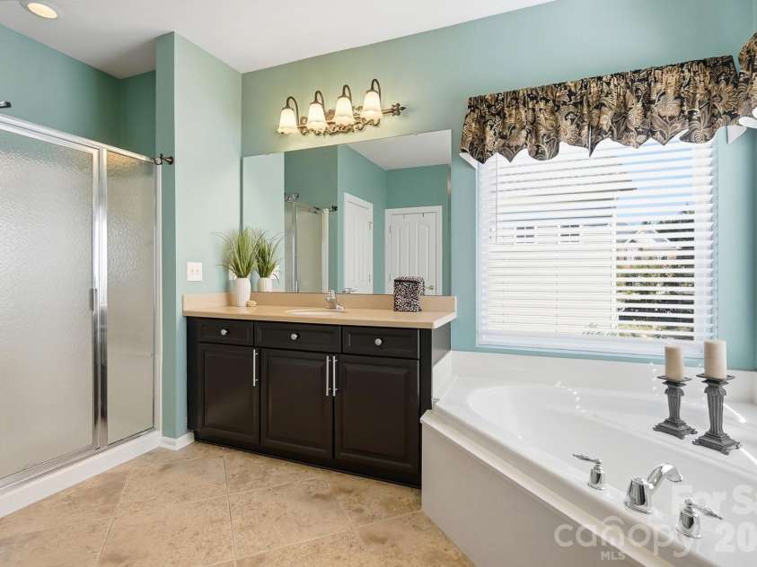 1103 Cooper Lane, Indian Trail, NC 28079.  MLS# CAR4431866, YatesRealty ID 56892. Primary Bathroom Suite