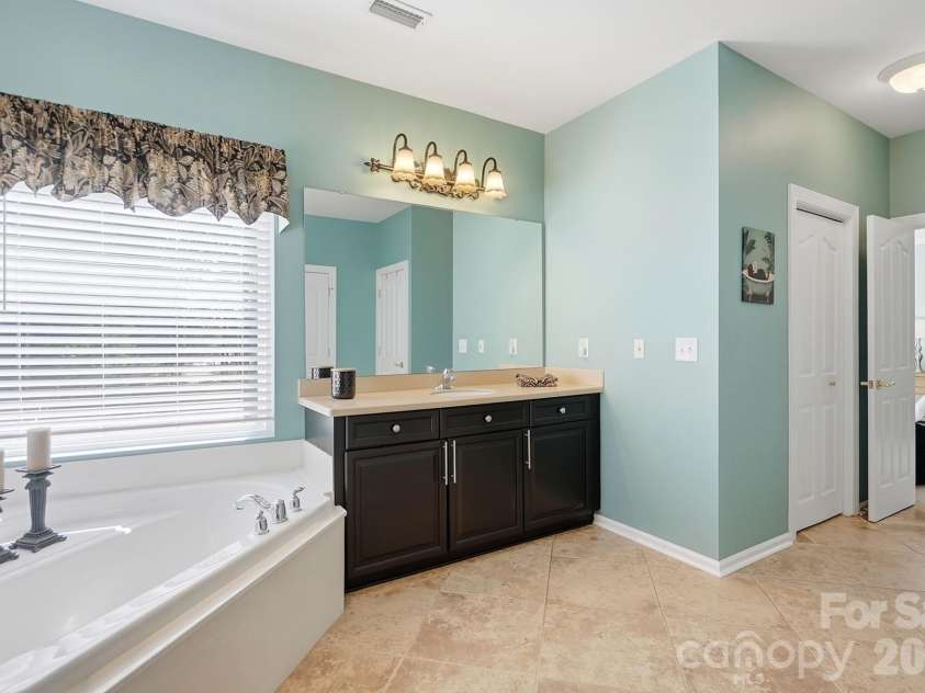 1103 Cooper Lane, Indian Trail, NC 28079.  MLS# CAR4431866, YatesRealty ID 56892. Primary Bathroom Suite