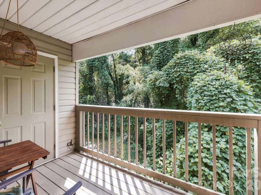 805 Carlyle Way, Asheville, NC 28803.  MLS# CAR4435205, YatesRealty ID 56893. Back deck with storage closet views