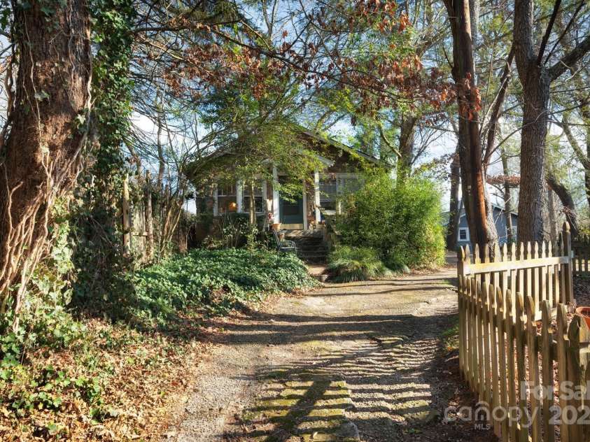 76 Lanvale Avenue, Asheville, NC 28806.  MLS# CAR4209001, YatesRealty ID 569. Private drive to Stone Cottage/ Unit #3 and additional off-street parking.