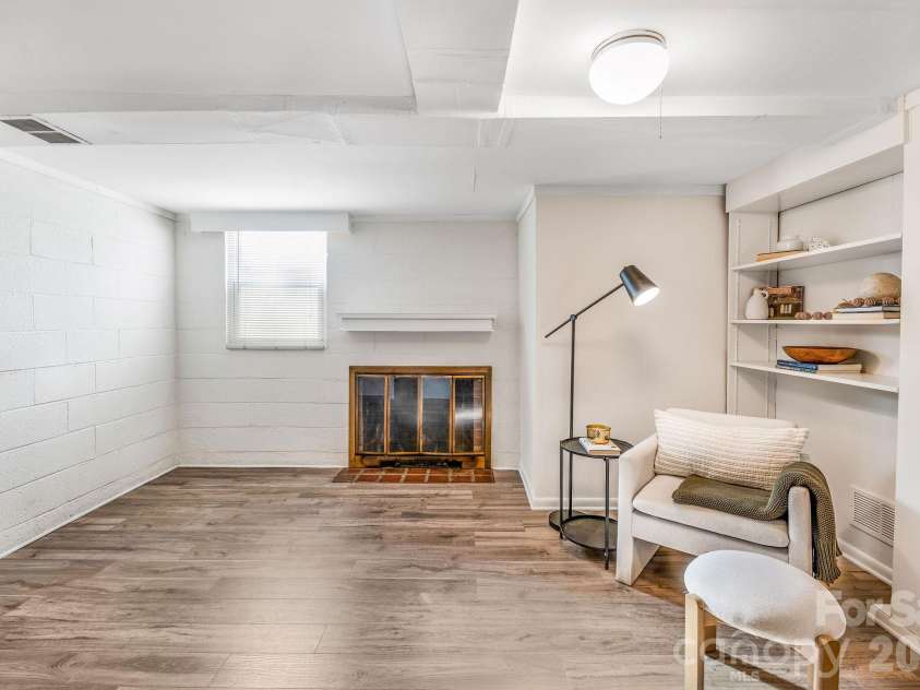 24 Cedar Street, Asheville, NC 28803.  MLS# CAR4422963, YatesRealty ID 56908. Freshly installed LVT flooring and additional fireplace