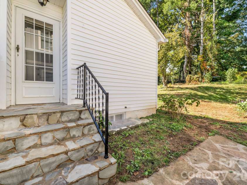 24 Cedar Street, Asheville, NC 28803.  MLS# CAR4422963, YatesRealty ID 56908. Lovely stone hardscaping.