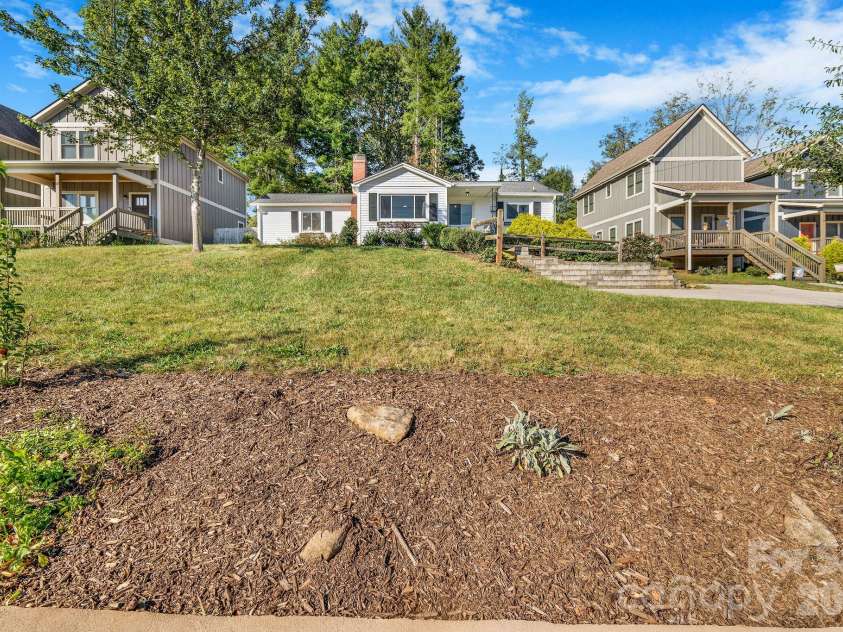 24 Cedar Street, Asheville, NC 28803.  MLS# CAR4422963, YatesRealty ID 56908. Placed far back off the road.