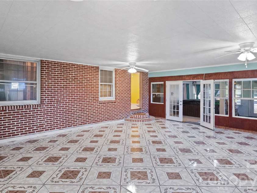 2340 NC 24/27 Road, Biscoe, NC 27209.  MLS# CAR4433696, YatesRealty ID 56912. Family Room/Dining Room Enhanced