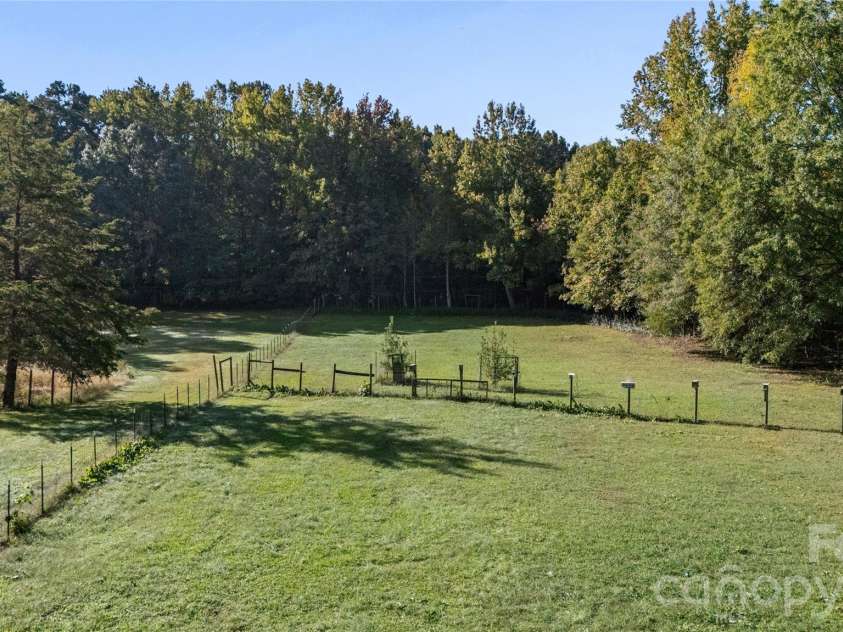 2340 NC 24/27 Road, Biscoe, NC 27209.  MLS# CAR4433696, YatesRealty ID 56912. Fence Field