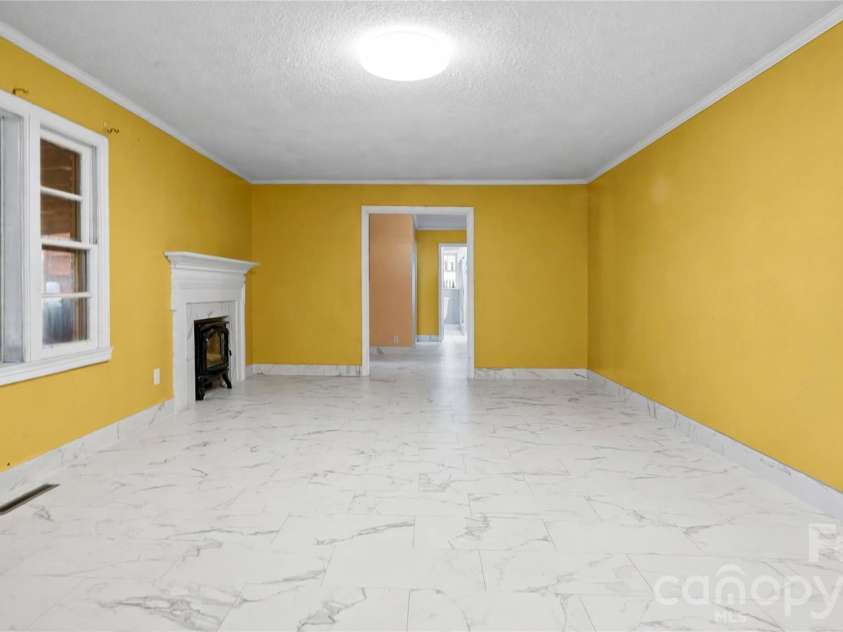 2340 NC 24/27 Road, Biscoe, NC 27209.  MLS# CAR4433696, YatesRealty ID 56912. Front Living Area Enhanced to show space
