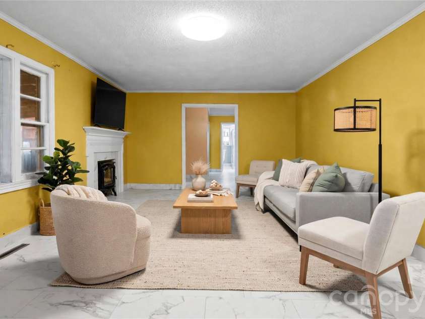 2340 NC 24/27 Road, Biscoe, NC 27209.  MLS# CAR4433696, YatesRealty ID 56912. Front Living Area Staged