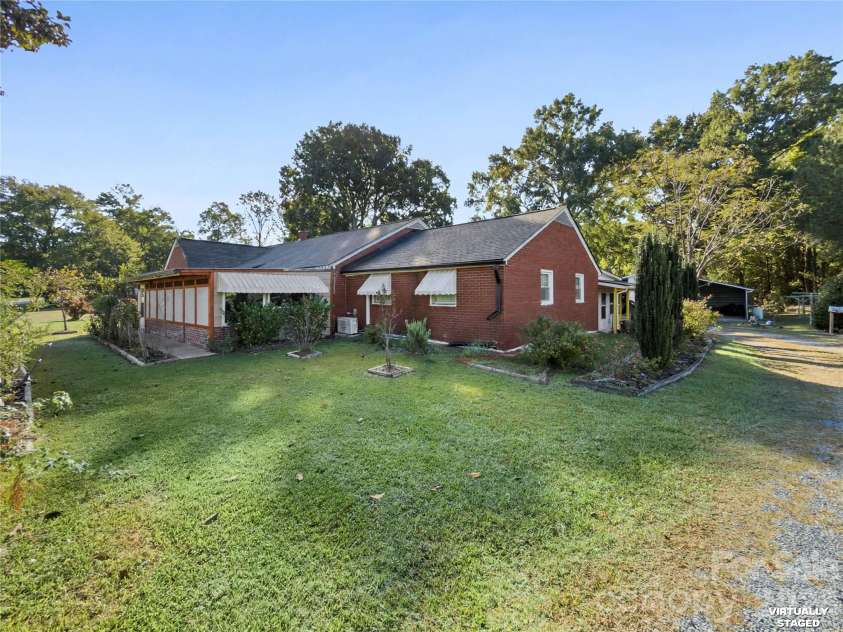 2340 NC 24/27 Road, Biscoe, NC 27209.  MLS# CAR4433696, YatesRealty ID 56912. Front of Home