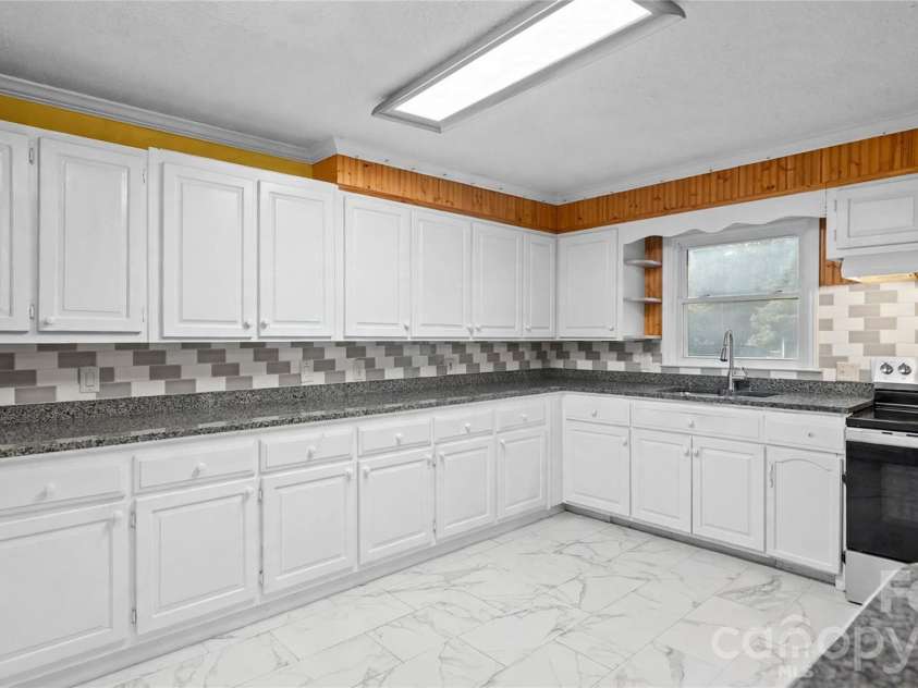 2340 NC 24/27 Road, Biscoe, NC 27209.  MLS# CAR4433696, YatesRealty ID 56912. Kitchen Enhanced