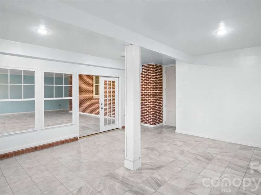 2340 NC 24/27 Road, Biscoe, NC 27209.  MLS# CAR4433696, YatesRealty ID 56912. Sunroom with Jacuzzi Enhanced