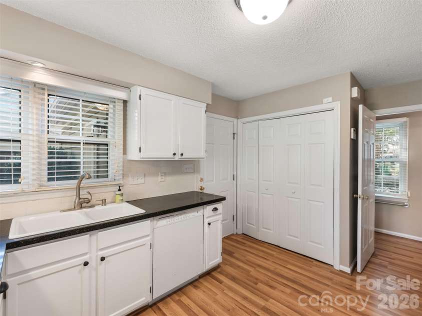 727 Clayfield Court, Charlotte, NC 28209.  MLS# CAR4434507, YatesRealty ID 56924. Kitchen with Laundry, Half Bath and to Garage