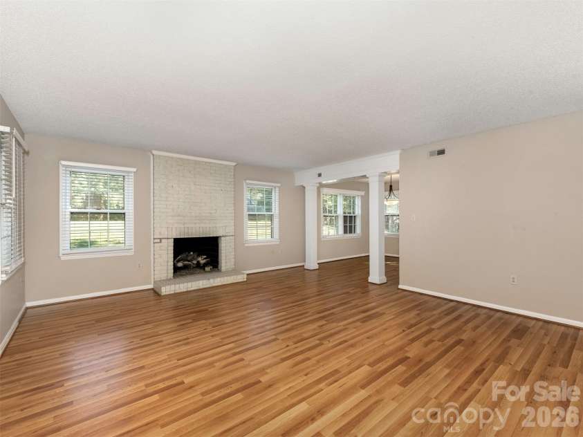 727 Clayfield Court, Charlotte, NC 28209.  MLS# CAR4434507, YatesRealty ID 56924. Living Room into Dining