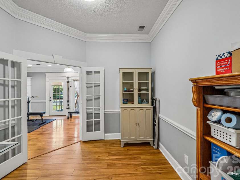 11207 Livingston Mill Road, Charlotte, NC 28273.  MLS# CAR4434862, YatesRealty ID 56926. Flex space on the main level