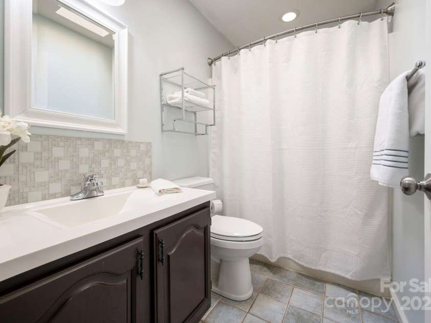 65 Forest Lake Drive, Asheville, NC 28803.  MLS# CAR4245225, YatesRealty ID 5693. Cute Guest Bathroom