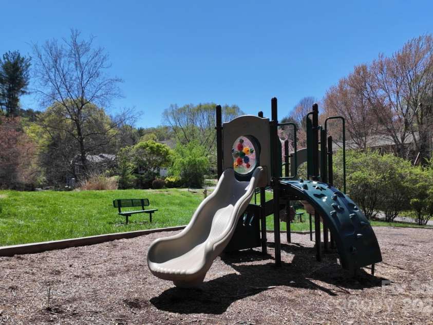 65 Forest Lake Drive, Asheville, NC 28803.  MLS# CAR4245225, YatesRealty ID 5693. Playground with open field