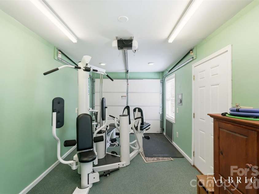 1419 Dennbriar Drive, Concord, NC 28027.  MLS# CAR4434471, YatesRealty ID 56938. Interior Of Separate Garage/Gym