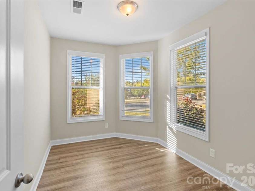 6556 Harris River Way, Charlotte, NC 28269.  MLS# CAR4434472, YatesRealty ID 56939. Light filled first floor office