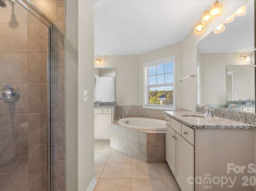 6556 Harris River Way, Charlotte, NC 28269.  MLS# CAR4434472, YatesRealty ID 56939. Separate shower
