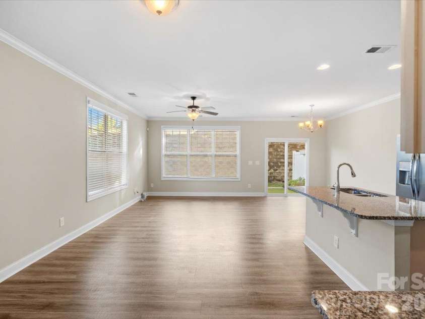 6556 Harris River Way, Charlotte, NC 28269.  MLS# CAR4434472, YatesRealty ID 56939. Spacious open living space
