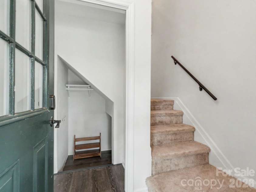 6000 Gray Gate Lane, Charlotte, NC 28210.  MLS# CAR4434446, YatesRealty ID 56940. Front entry and drop zone/under stair storage