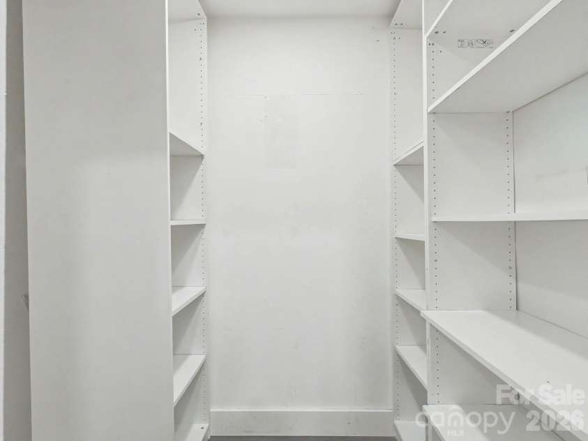 6000 Gray Gate Lane, Charlotte, NC 28210.  MLS# CAR4434446, YatesRealty ID 56940. Pantry and Laundry