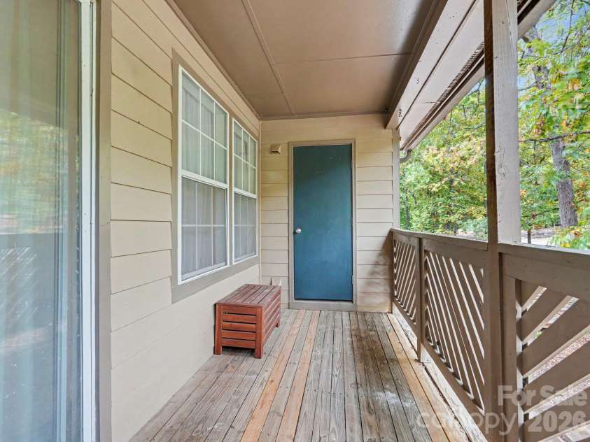 6000 Gray Gate Lane, Charlotte, NC 28210.  MLS# CAR4434446, YatesRealty ID 56940. Porch with Storage closet
