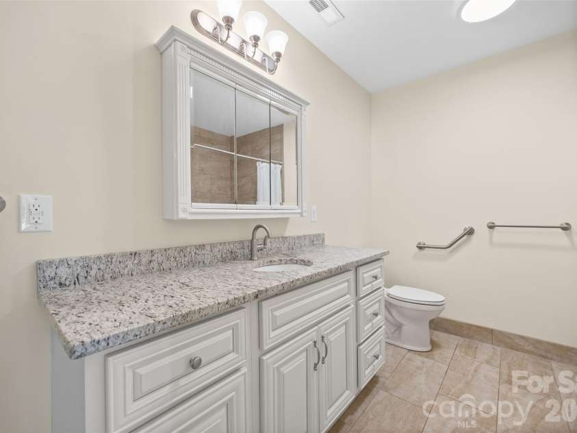 3117 Monte Drive, Monroe, NC 28110.  MLS# CAR4434474, YatesRealty ID 56942. Office bathroom