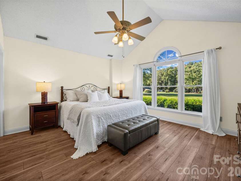 3117 Monte Drive, Monroe, NC 28110.  MLS# CAR4434474, YatesRealty ID 56942. Primary bedroom overlook a spacious front yard.