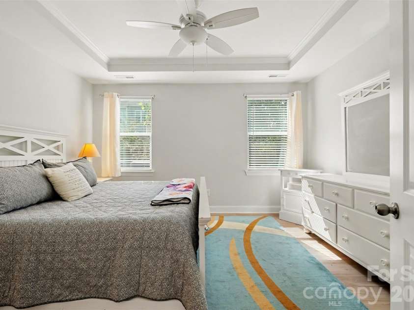 4159 Black Court, Harris, NC 28075.  MLS# CAR4434177, YatesRealty ID 56949. Primary bedroom with tray ceiling on the main level.