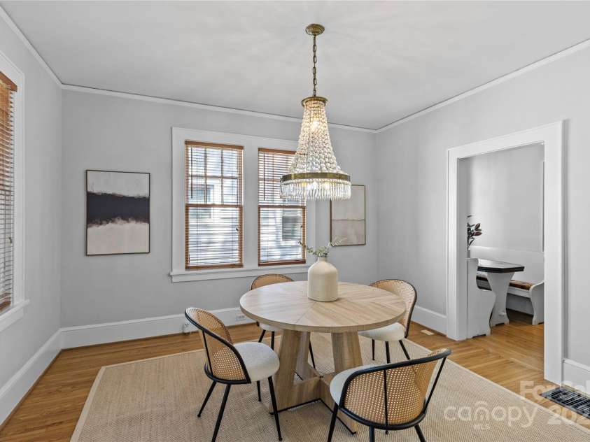 2125 Kenilworth Avenue, Charlotte, NC 28203.  MLS# CAR4244475, YatesRealty ID 5695. Dining room with vintage chandelier