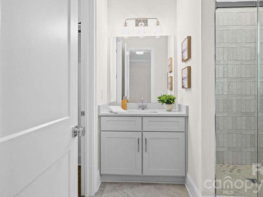 6918 Alexander Road, Charlotte, NC 28226.  MLS# CAR4434180, YatesRealty ID 56950. Main level guest bath