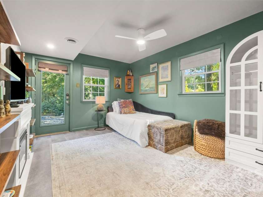 5145 Murrayhill Drive, Charlotte, NC 28210.  MLS# CAR4434043, YatesRealty ID 56955. Lower level bedroom with exterior door