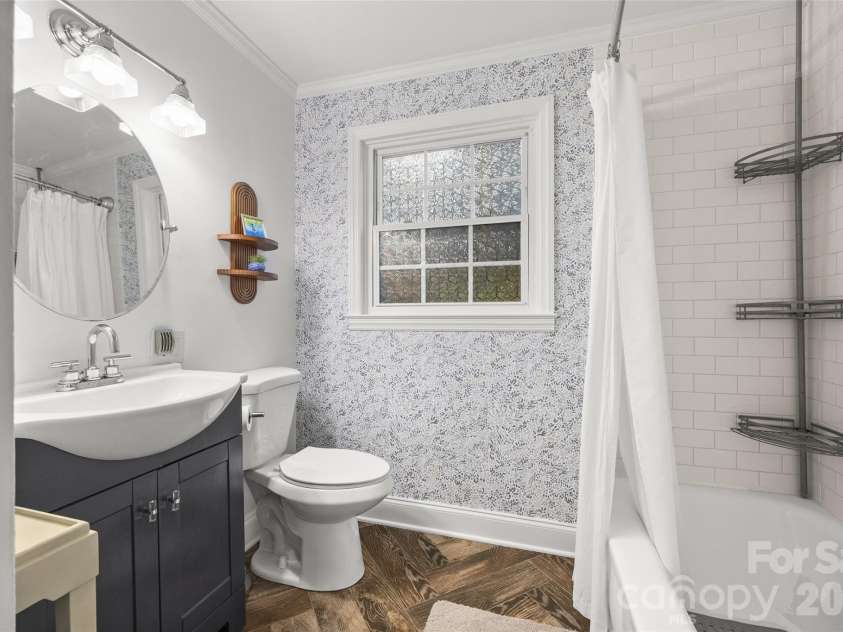 5145 Murrayhill Drive, Charlotte, NC 28210.  MLS# CAR4434043, YatesRealty ID 56955. Renovated lower level bath